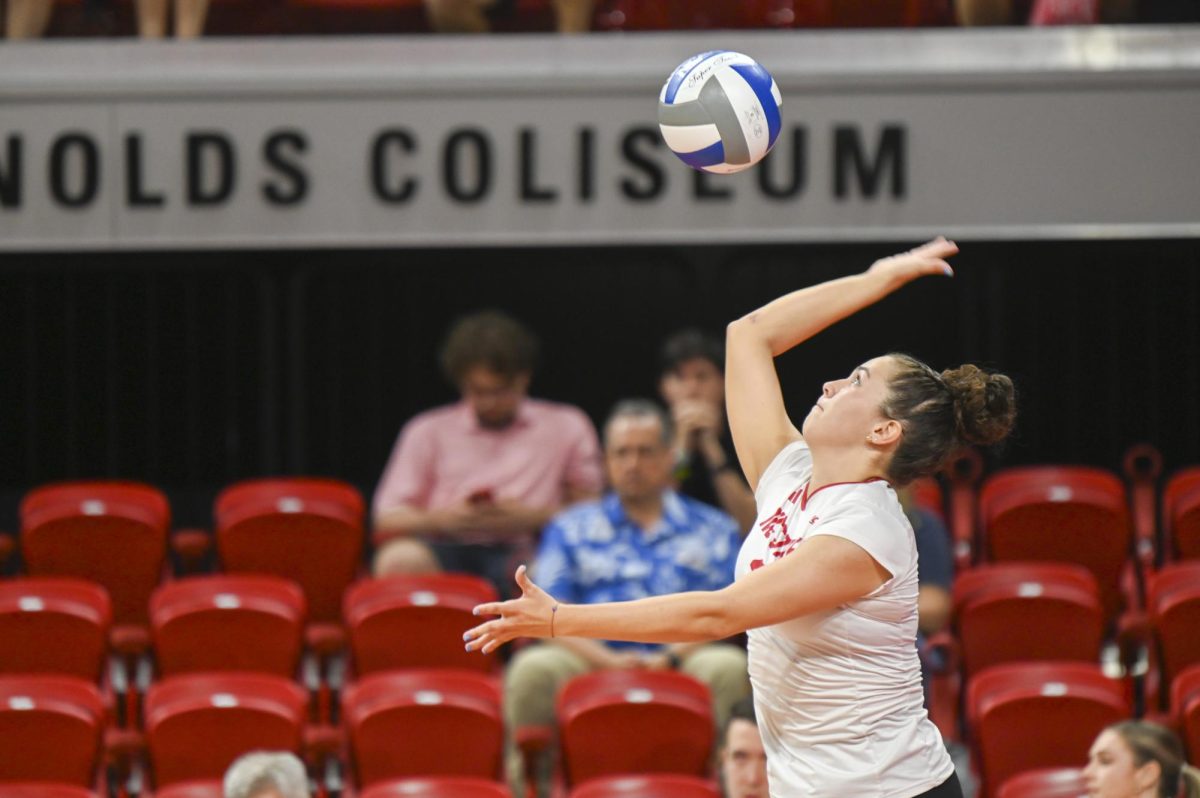 Redshirt junior setter Elaisa Villar serves the ball during the volleyball match against Green Bay in Reynolds Coliseum on Saturday, Aug. 30, 2025. Villar had two service aces. NC State beat Green Bay 3-2.