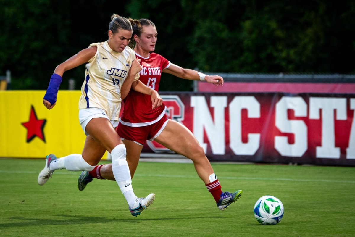 Junior forward Jade Bordeleau fights for the ball during the game against James Madison at Dail Soccer Field on Thursday, August 14, 2025. The Dukes beat the Wolfpack 3-0.