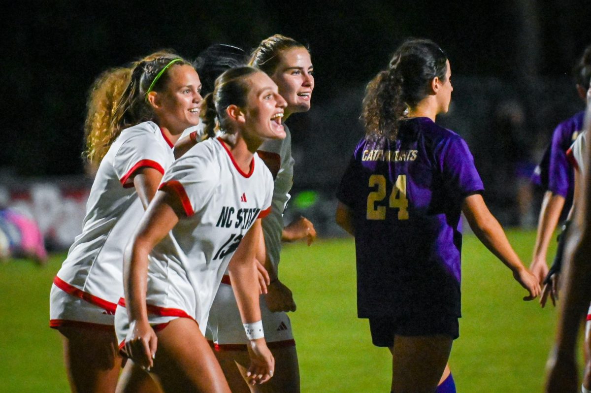 Junior forward Jade Bordeleau and Redshirt junior forward Erica Roberts celebrate a goal during the game against Western Carolina at Dail Soccer Field on Wednesday, Aug. 27, 2025. The Wolfpack lost to the Catamounts 3-2.