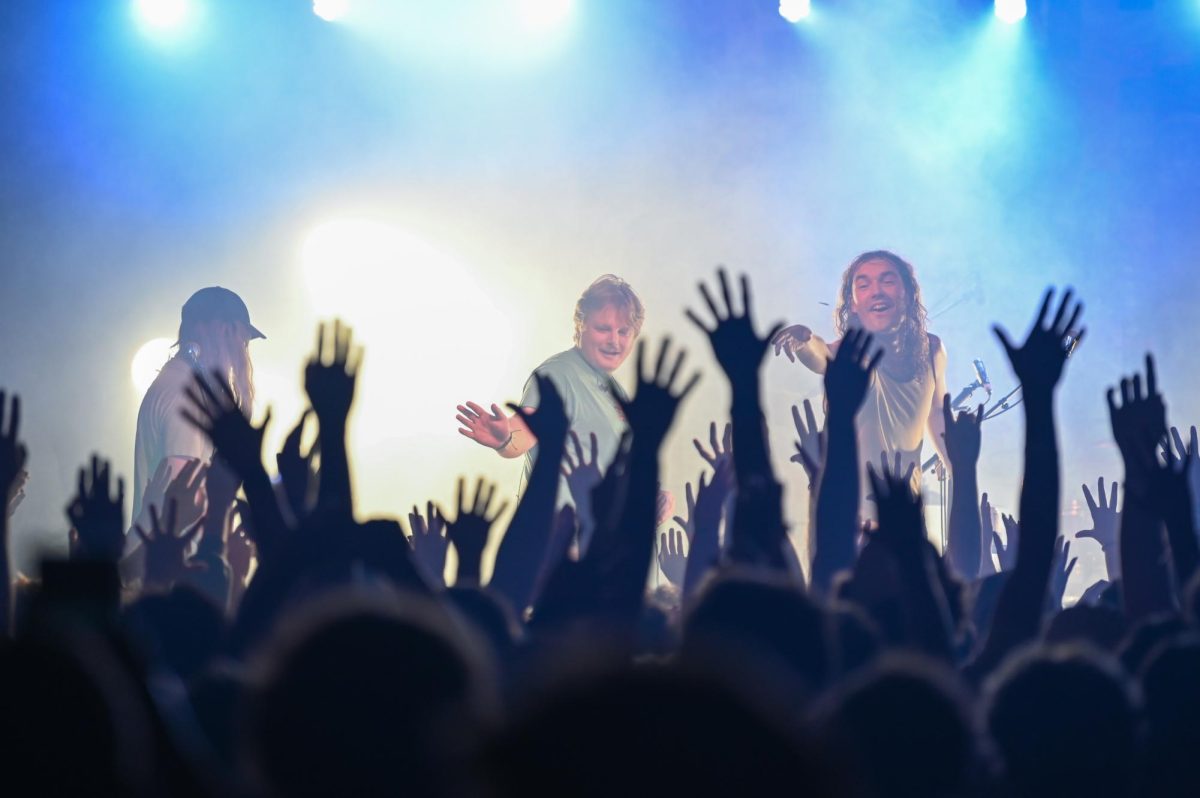 The Backseat Lovers celebrating the crowd after their show at the Cat’s Cradle in Carrboro on Sept. 17, 2025. The Backseat Lovers are a rock band from Provo, Utah created in 2018.