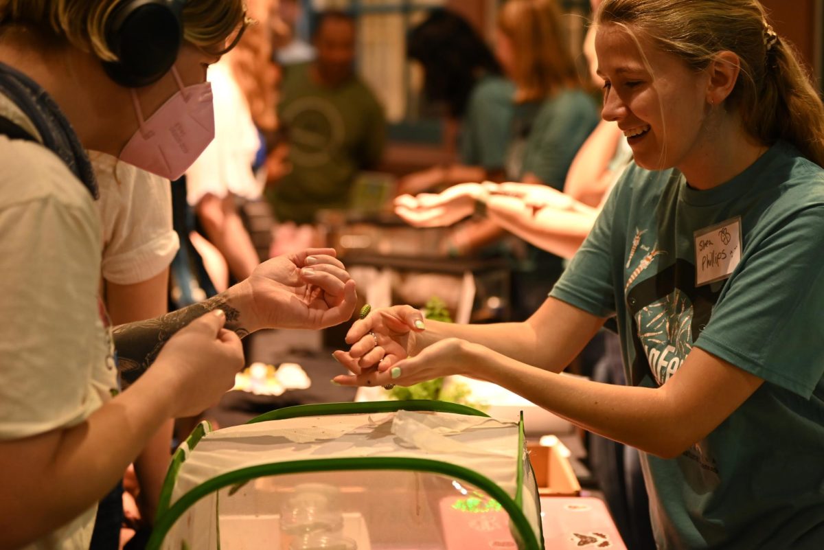 Shea Phillips, a Museum of Natural Science Member, displays a caterpillar at Bugfest on Saturday, Sept 20, 2025. The event was open to the public with food trucks, vendors and volunteers.