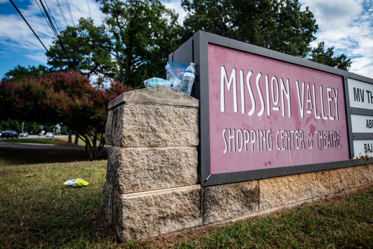 Trash perched upon a Mission Valley Shopping Center sign near Cup A Joe Mission Valley on Friday, Sept. 26, 2025. After a three year closure, Cup A Joe Mission Valley reopened on Aug. 11, 2025.