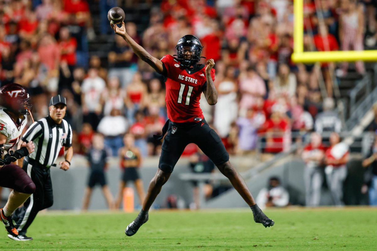 Sophomore quarterback CJ Bailey throws the ball down field during the game against Virginia Tech on Saturday, Sept. 27, 2025. Bailey threw for 240 yards with two touchdowns. NC State lost to Virginia Tech 23-21.