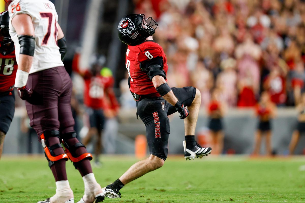 Graduate student linebacker Cian Slone celebrates getting a sack during the game against Virginia Tech on Saturday, Sept. 27, 2025. Slone had one sack and seven tackles. NC State lost to Virginia Tech 23-21.