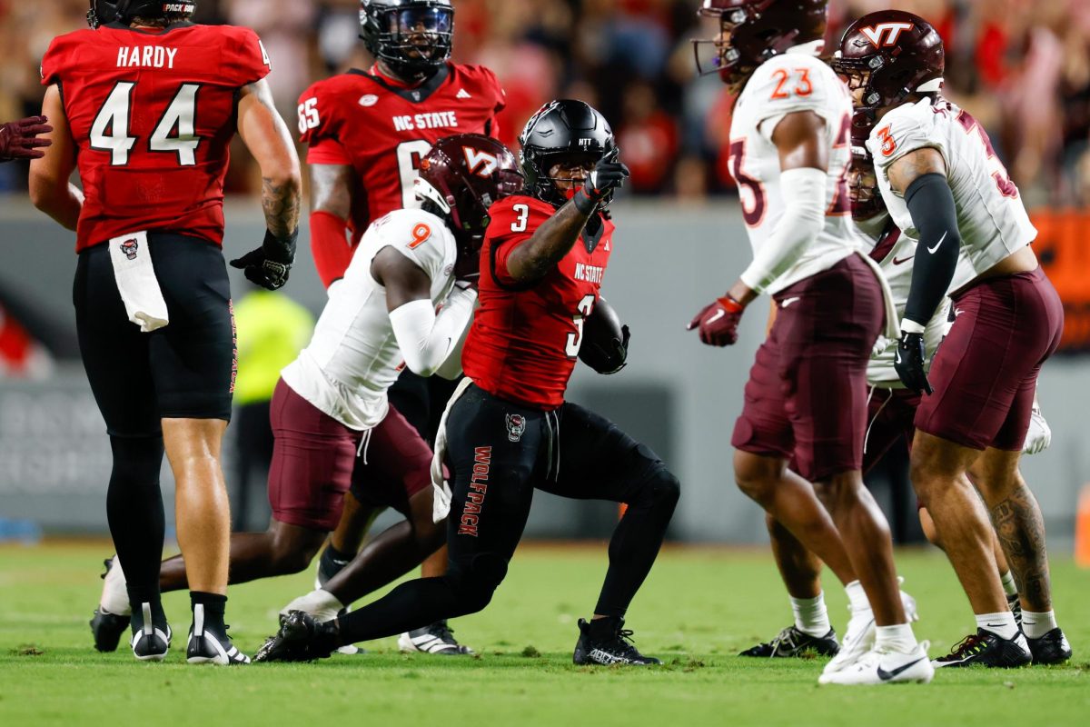 Sophomore running back Hollywood Smothers points towards the endzone after getting a first down during the game against Virginia Tech on Saturday, Sept. 27, 2025. Smothers rushed for 67 yards on 16 attempts. NC State lost to Virginia Tech 23-21.