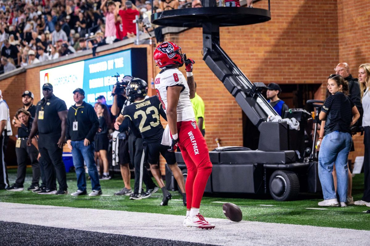 Sophomore wide reciever Keenan Jackson shushes the crowd after catching a touchdown during the game against Wake Forest in Allegacy Stadium on Thursday, Sept. 11, 2025. The Wolfpack beat the Demon Deacons 34-24.