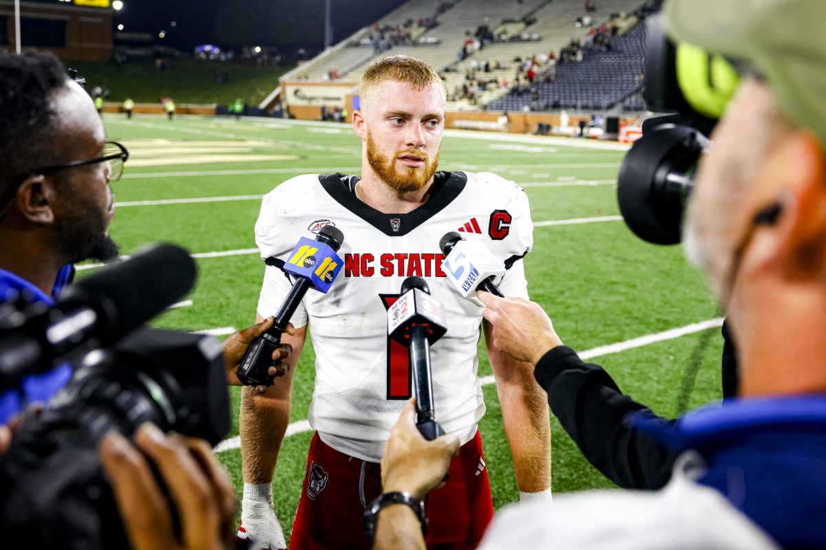 Graduate linebacker Caden Fordham talks to the press on the field after the game against Wake Forest in Allegacy Stadium on Thursday, Sept. 11, 2025. Fordham had two solo tackles. The Wolfpack beat the Demon Deacons 34-24.