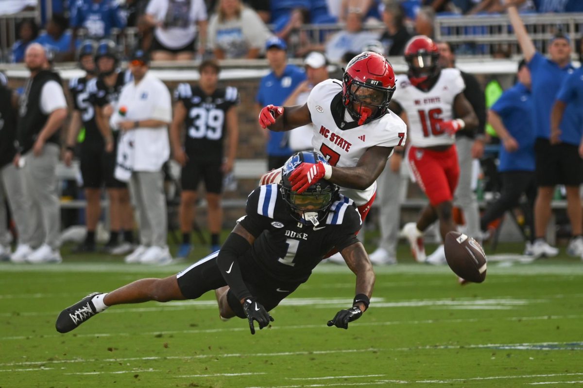 Redshirt sophomore cornerback Brian Nelson, II stops a pass from a rival receiver during the game against Duke at Wallace Wade Stadium on Saturday, Sept. 20, 2025. NC State lost to Duke 45-33.