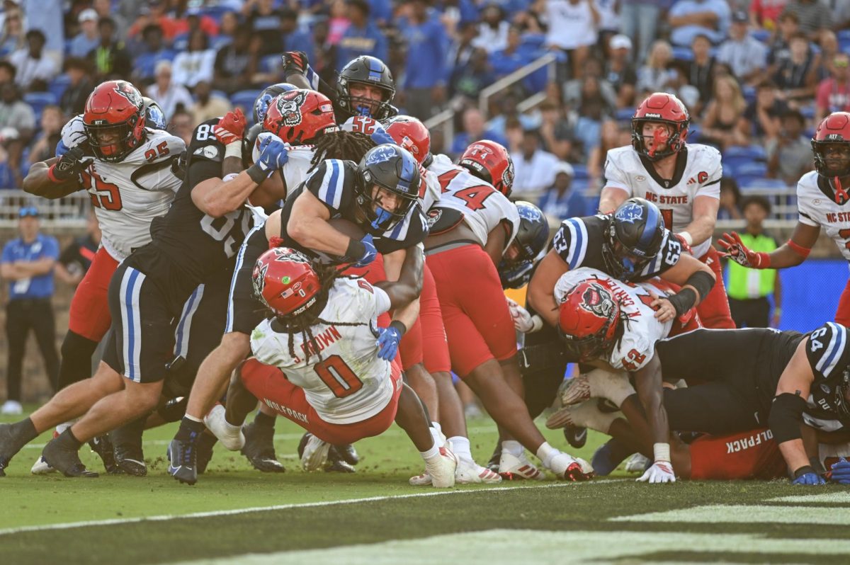 The Wolfpack try to hold the Blue Devils out of the endzone during the game against Duke at Wallace Wade Stadium on Saturday, Sept. 20, 2025. NC State lost to Duke 45-33.