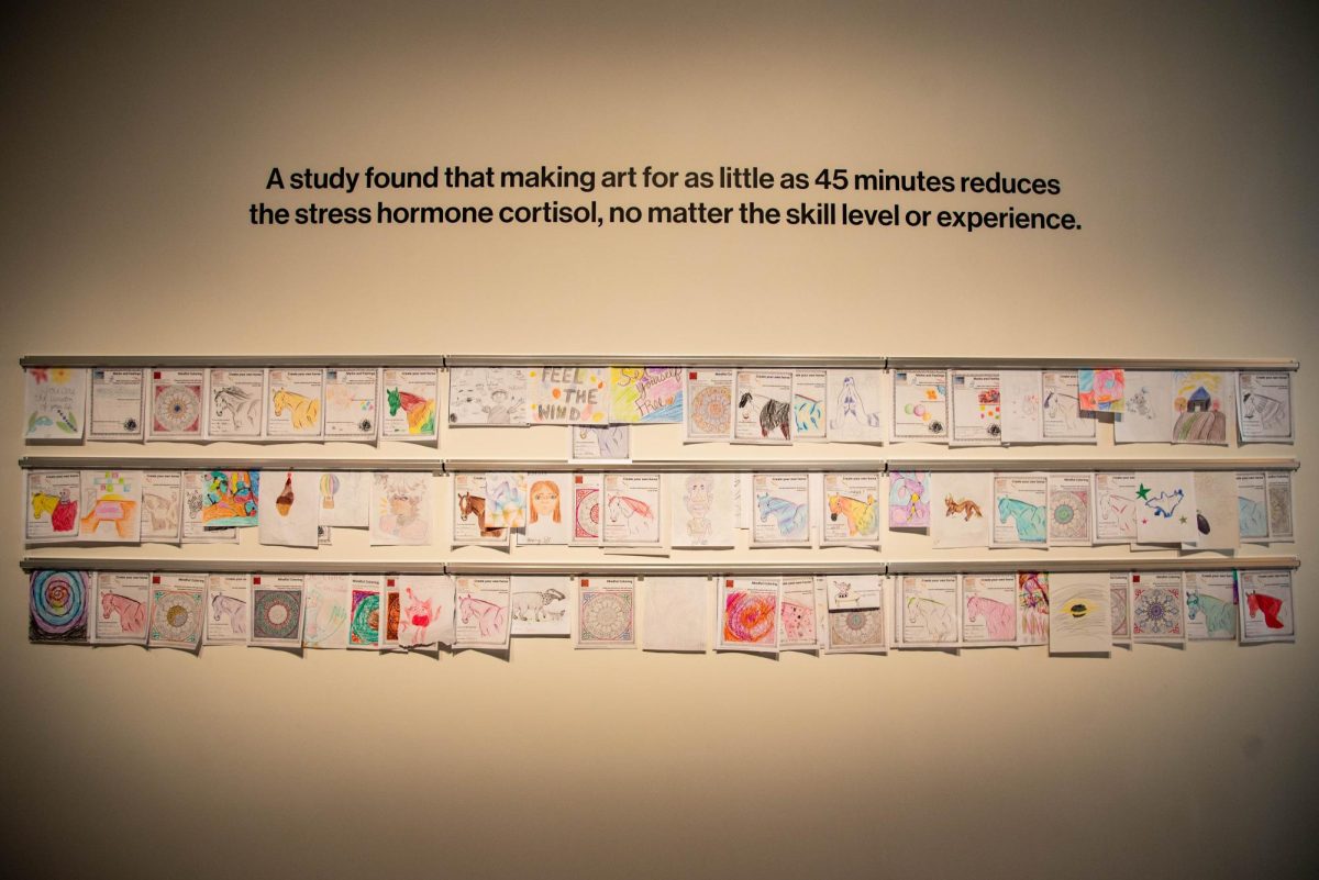 Visitor-made artwork hangs on the wall of the The Gregg Museum of Art & Design in the Your Brain on Art Exhibit. The exhibit posits artwork around quotes from Susan Magsamen and Ivy Ross’s best-selling book, Your Brain on Art: How the Arts Transform Us.