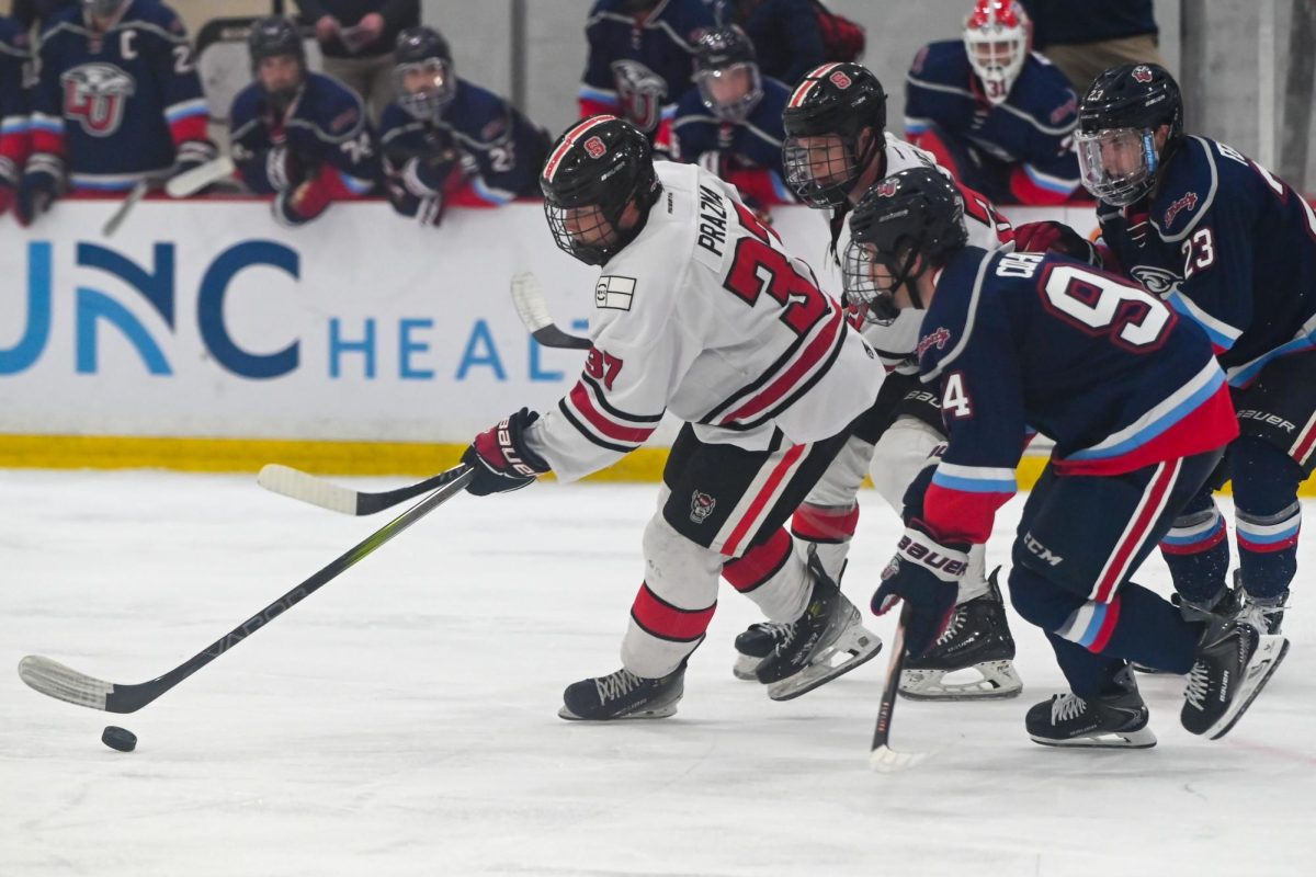 Sophomore forward Daniel Prazma skates away from liberty players to the puck during the game against Liberty at Invisalign Arena on Friday, Sept 12, 2025. Icepack fell to Liberty 4-2.