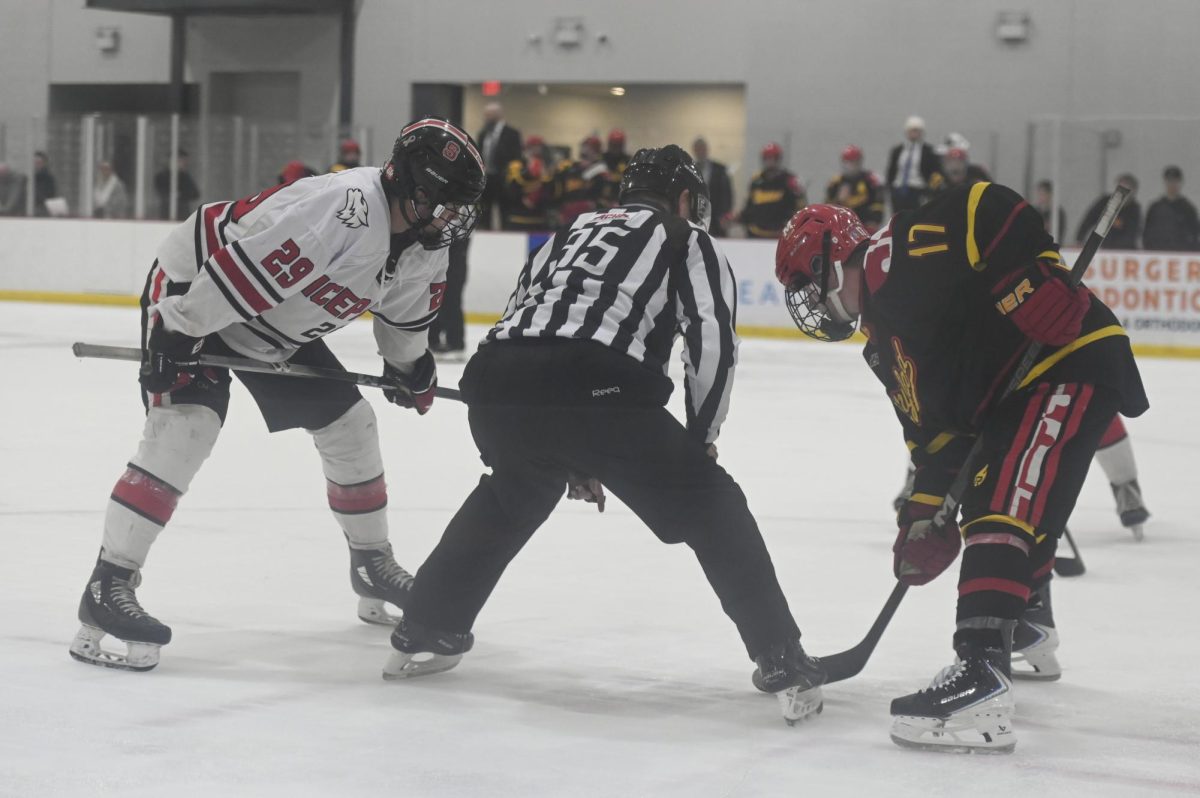 Junior forward Holden Koufman prepares for a faceoff during the game against Maryland at Invisalign Arena on Friday, Sept 26, 2025. NC State beat Maryland 4-1. 
