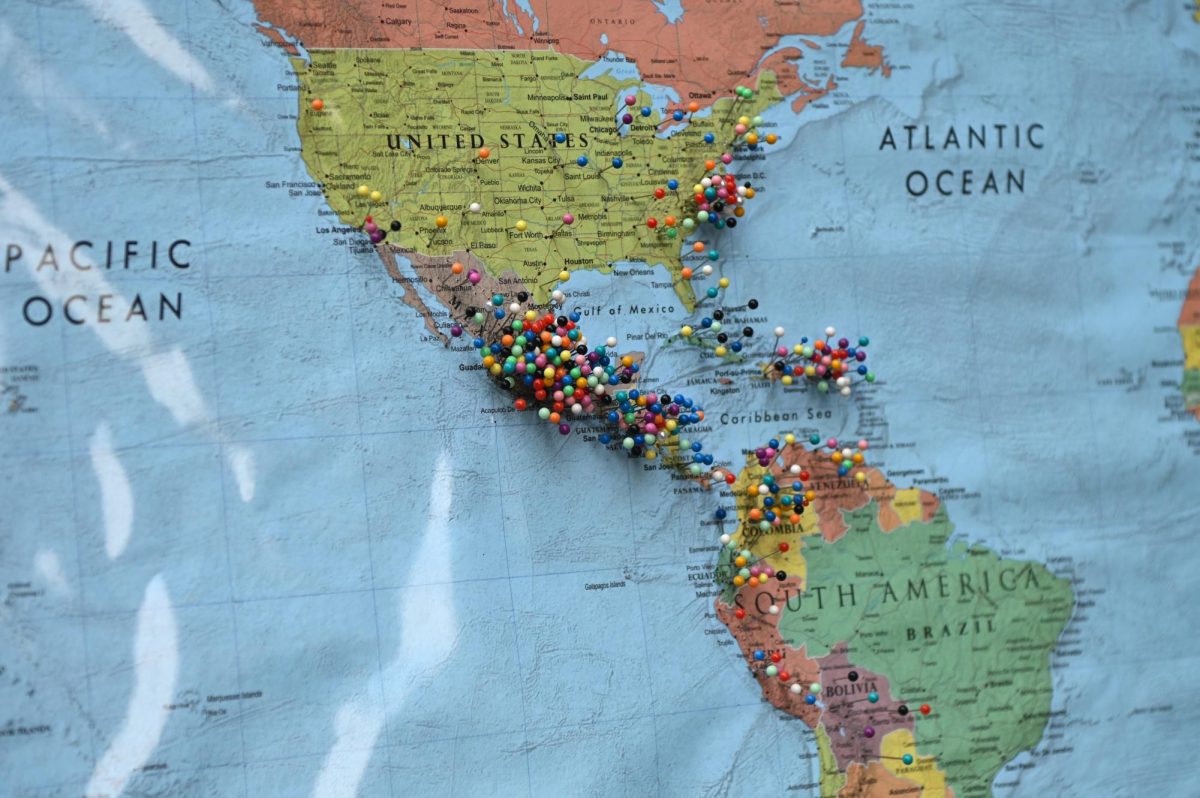 Pinned markers show festivalgoers’ home countries and cities during La Fiesta del Pueblo at Fayetteville Street Historic District on Sunday, Sept. 21, 2025. The event, which draws thousands annually, is organized by El Pueblo to celebrate the pride and resilience of the Latine community.