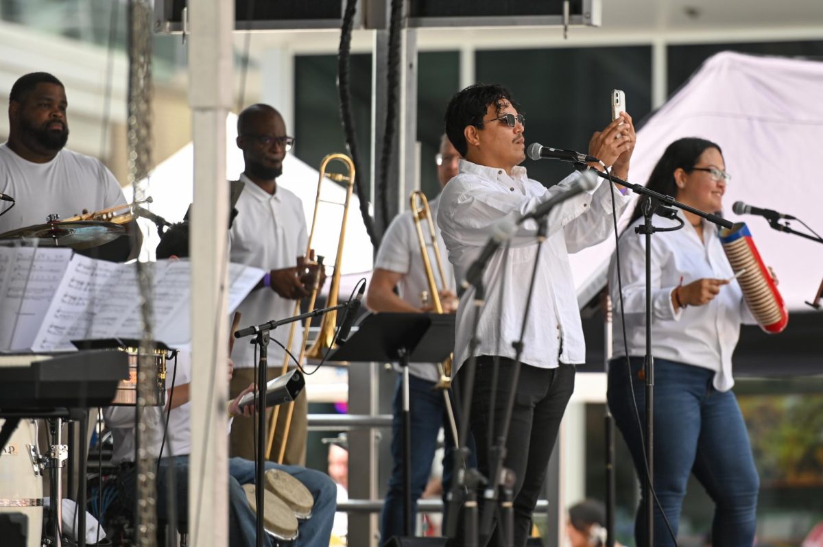 Salsa band La Nueva 22 perform during La Fiesta del Pueblo at Fayetteville Street Historic District on Sunday, Sept. 21, 2025. The event, which draws thousands annually, is organized by El Pueblo to celebrate the pride and resilience of the Latine community.
