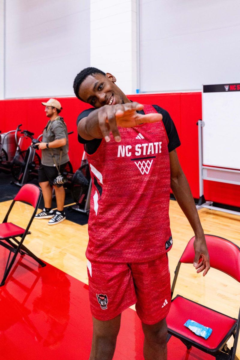 Redshirt junior guard Terrance Arceneaux poses doing a celebration pose before the first official practice of the 2025-2026 season on Monday, Sept. 22, 2025, inside the Dail Basketball Center. The annual media availability marked the start of another Wolfpack basketball season.
