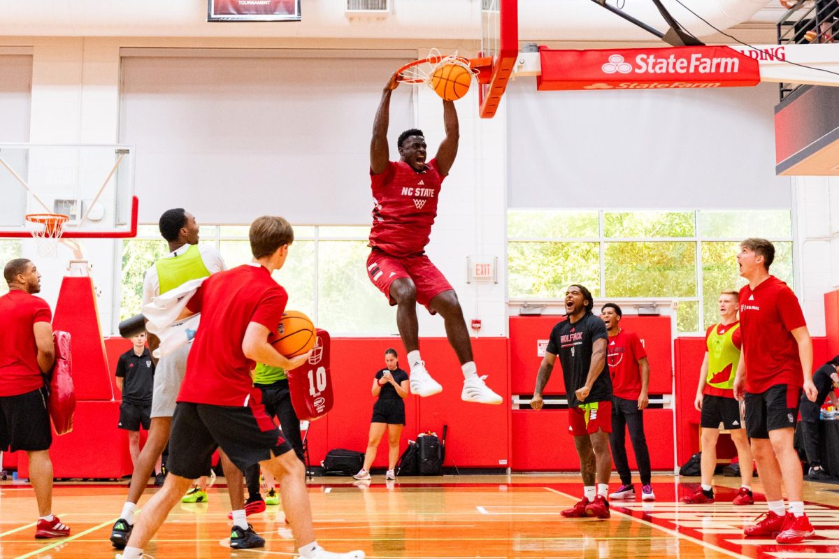 Senior center Scottie Ebube yells while dunking the ball during the first official practice of the 2025-2026 season on Monday, Sept. 22, 2025, inside the Dail Basketball Center. This practice marked the yearly start of practice and offered insight into Wade’s approach in his first year leading it.