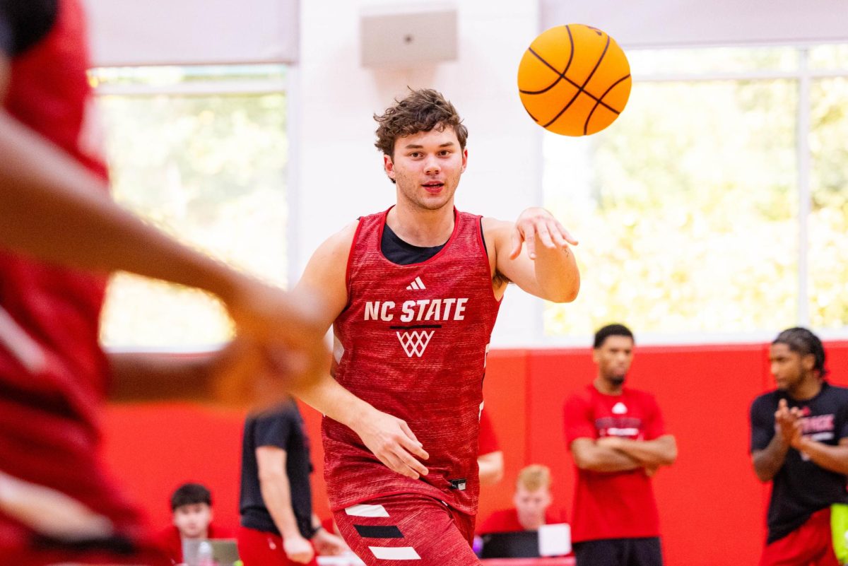 Redshirt freshman forward Colt Langdon passes the ball during the first official practice of the 2025-2026 season on Monday, Sept. 22, 2025, inside the Dail Basketball Center. The event gave reporters a chance to watch the Wolfpack up close as the team prepared for the upcoming season.