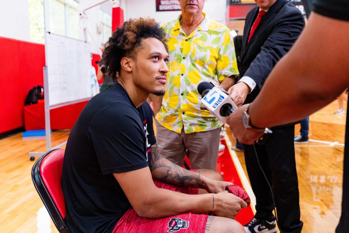 Senior forward Darrion Williams listens to a reporter ask a question before the first official practice of the 2025-2026 season on Monday, Sept. 22, 2025, inside the Dail Basketball Center. The media session offered reporters a closer look at the Wolfpack as preparations for the new season began.