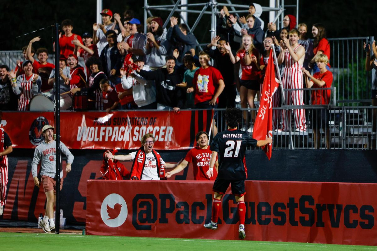 Graduate midfielder Max Ogawa celebrates with the Red Terrors student section after scoring a goal during the game against William & Mary University at Dail Soccer Field on Tuesday, Sep. 16, 2025. Ogawa scored two goals. NC State beat W&M 7-0.