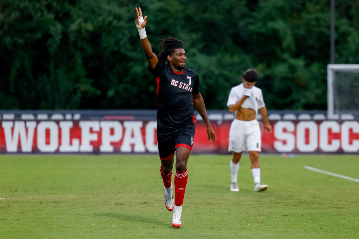Junior forward Donavan Phillip holds up four fingers after scoring his fourth goal during the game against William & Mary University at Dail Soccer Field on Tuesday, Sep. 16, 2025. Phillip scored four goals in 28 minutes. NC State beat W&M 7-0.