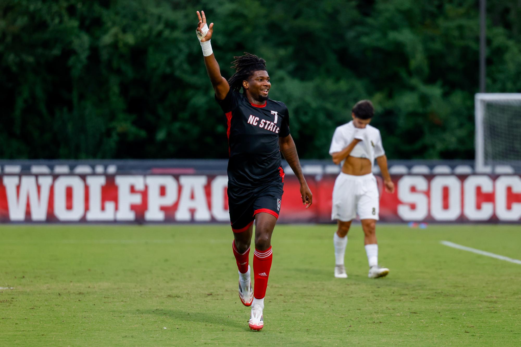 Junior forward Donavan Phillip holds up four fingers after scoring his fourth goal during the game against William & Mary University at Dail Soccer Field on Tuesday, Sep. 16, 2025. Phillip scored four goals in 28 minutes. NC State beat W&M 7-0.