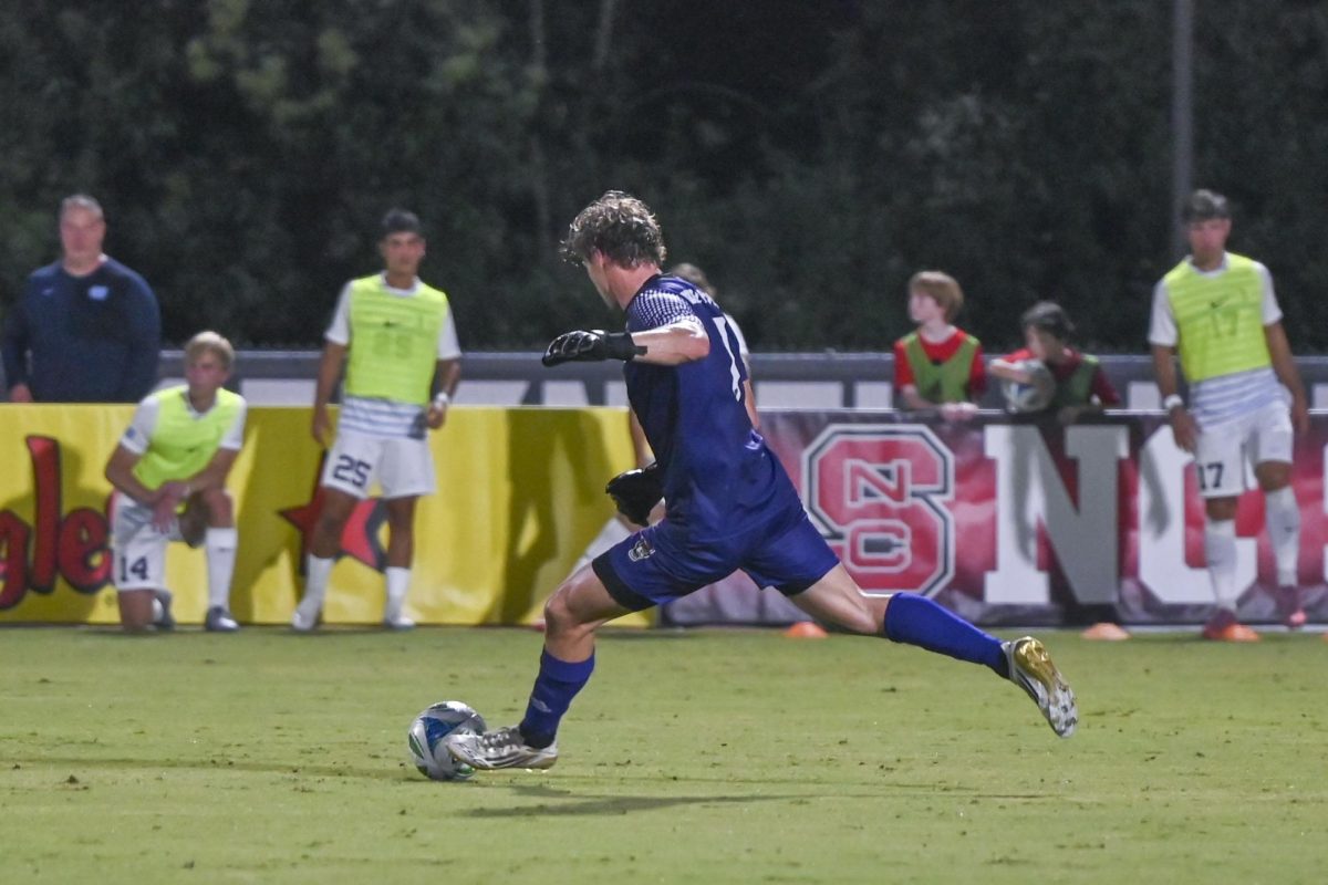 Senior goalkeeper Logan Erb kicks the ball during the men's soccer match against UNC-Chapel Hill at Dail Soccer Field on Friday, Sept. 5, 2025. Erb had two saves. NC State tied with UNC 0-0.