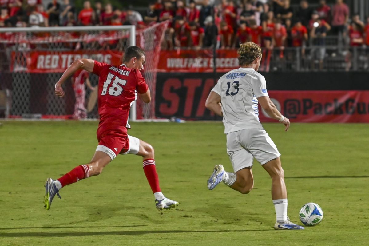 Redshirt junior forward Aidan Payne falling back to defend during the men's soccer match against UNC-Chapel Hill at Dail Soccer Field on Friday, Sept. 5, 2025. Payne had one shot on goal. NC State tied with UNC 0-0.