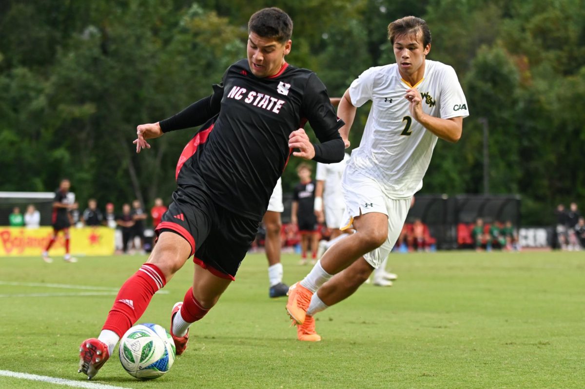 Senior midfielder Justin Mclean chases after the ball during the game against William & Mary at Dail Soccer Stadium on Tuesday, Sept 16, 2025. Mclean had one shot on goal. NC State beat William & Mary 7-0.