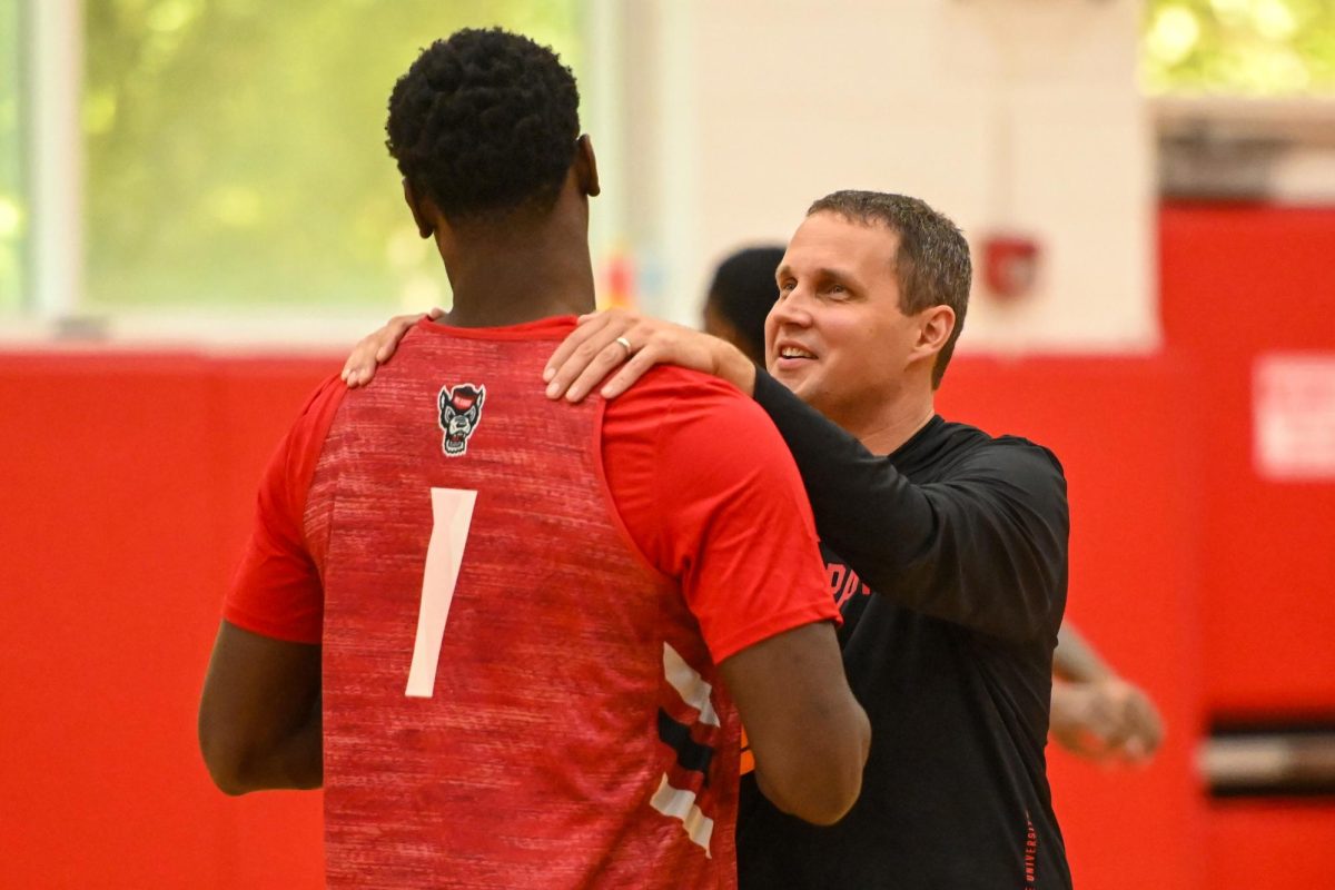 Head coach Will Wade talks to senior center Scottie Ebube 
before the open media practice inside the Dail Center on Monday, Sept. 22, 2025. The men’s basketball program hosted the media for the first 30 minutes of its first official practice for the 2025-26 basketball season.