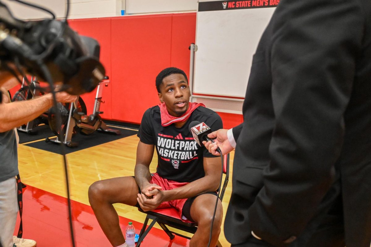Redshirt junior guard Terrance Arceneaux talks with a reporter before the first official practice of the 2025-2026 season. The men’s basketball program hosted the media for the first 30 minutes of its first open practice inside the Dail Center on Monday, Sept. 22, 2025.