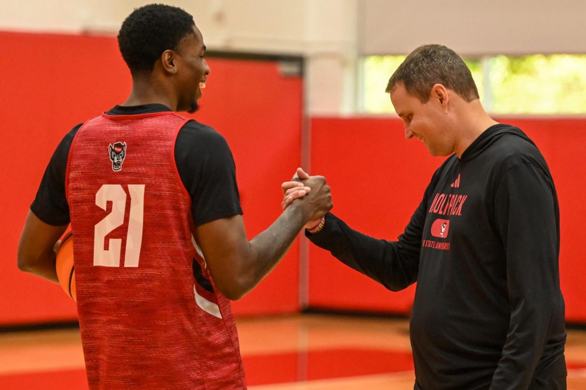 Head coach Will Wade greets redshirt junior guard Terrance Arceneaux before the open media practice inside the Dail Center on Monday, Sept. 22, 2025. The men’s basketball program hosted the media for the first 30 minutes of its first official practice for the 2025-26 basketball season.