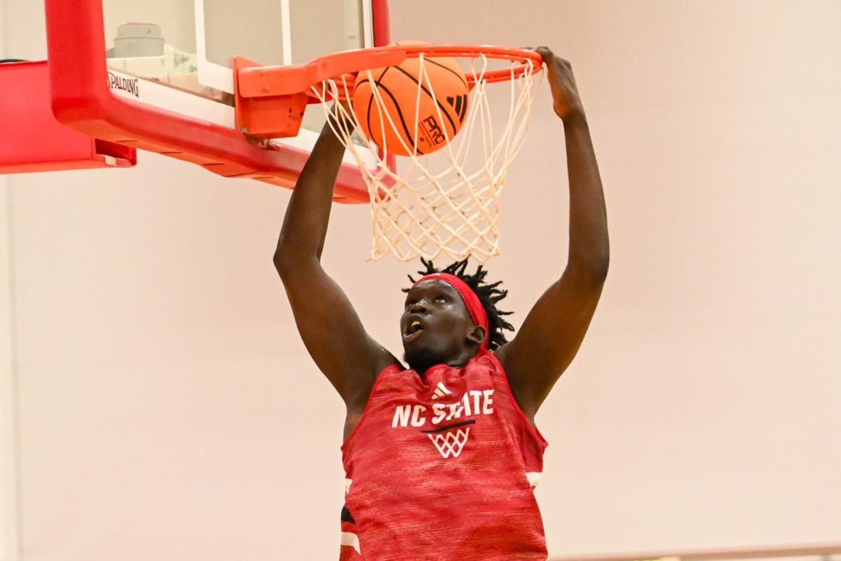 Junior forward Jerry Deng dunks the ball during the open media practice inside the Dail Center on Monday, Sept. 22, 2025. The men’s basketball program hosted the media for the first 30 minutes of its first official practice for the 2025-26 basketball season.