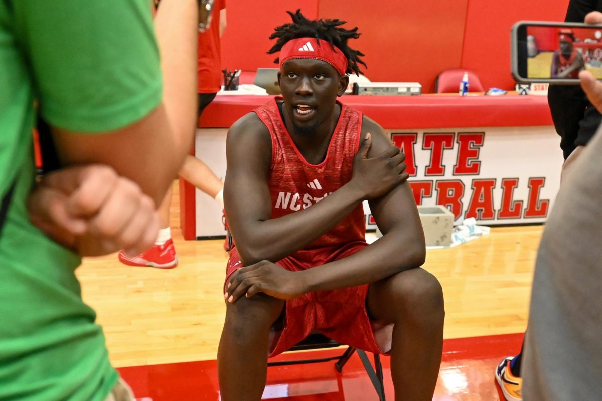 Junior forward Jerry Deng talks with reporters before the first official practice of the 2025-2026 season. The men’s basketball program hosted the media for the first 30 minutes of its first open practice inside the Dail Center on Monday, Sept. 22, 2025.