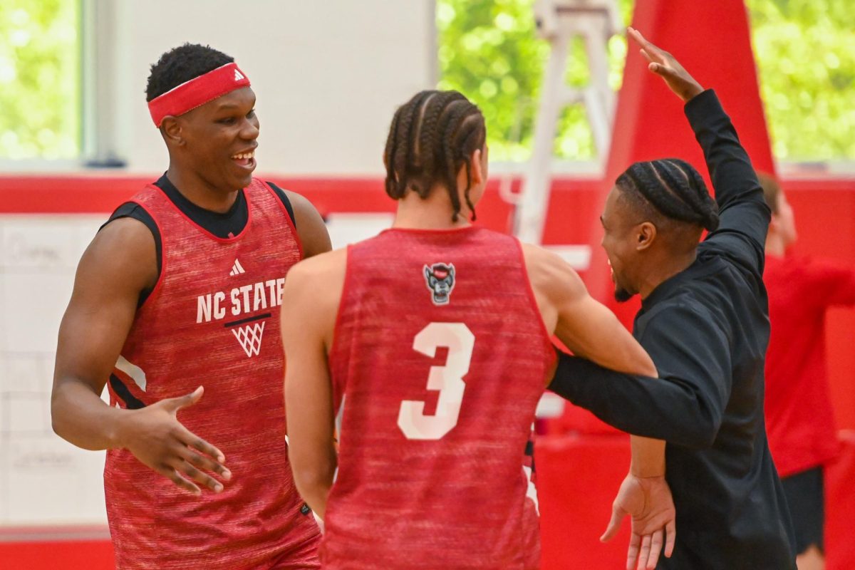 Senior forward Ven-Allen Lubin laughs at the middle of the court during the open media practice inside the Dail Center on Monday, Sept. 22, 2025. The men’s basketball program hosted the media for the first 30 minutes of its first official practice for the 2025-26 basketball season.