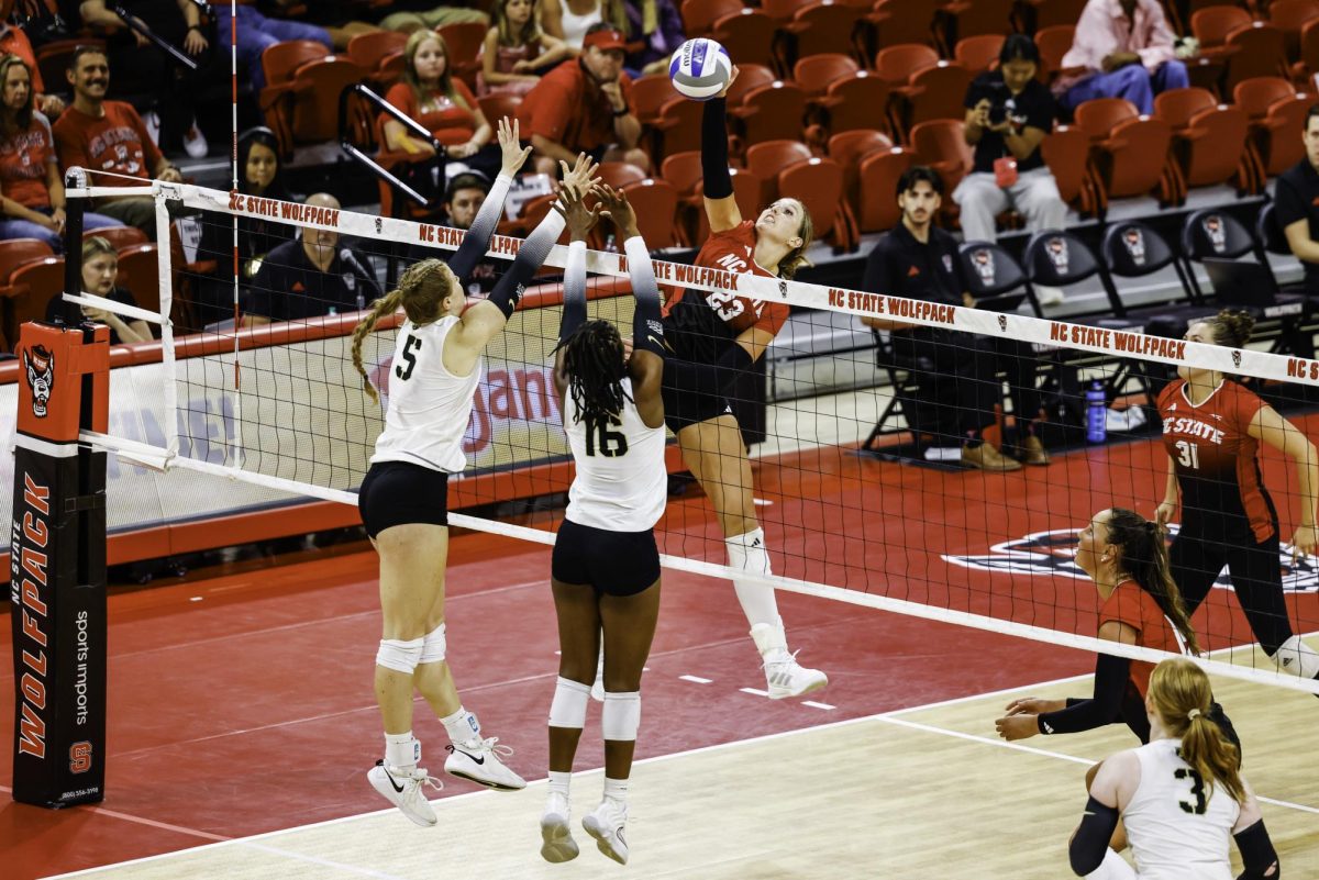 Freshman opposite hitter Jordan Smith celebrates after scoring a point during the match against Army in Reynolds Coliseum on Friday, Aug. 29, 2025. Smith had 6 kills. NC State beat Army 3-0.
