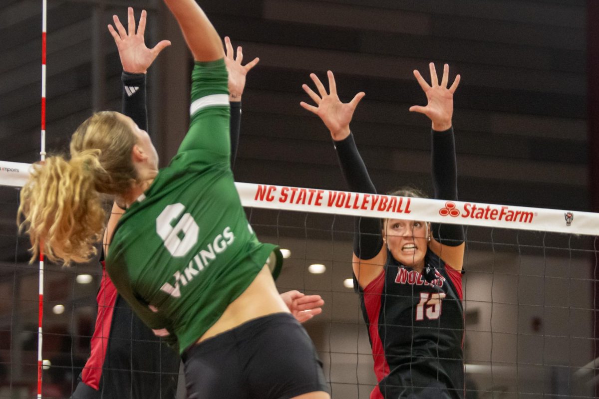 Senior middle blocker Lily Cropper braces for a block during the match against Cleveland State in Reynolds Coliseum on Saturday, Sept. 13, 2025. Cropper had four kills. The Wolfpack defeated the Vikings 3-0.