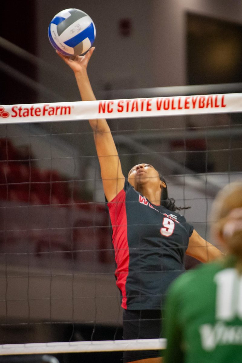 Freshman opposite Sa'mya Dorsey spikes the ball during the match against Cleveland State in Reynolds Coliseum on Saturday, Sept. 13, 2025. Dorsey made six total attempts. The Wolfpack defeated the Vikings 3-0.