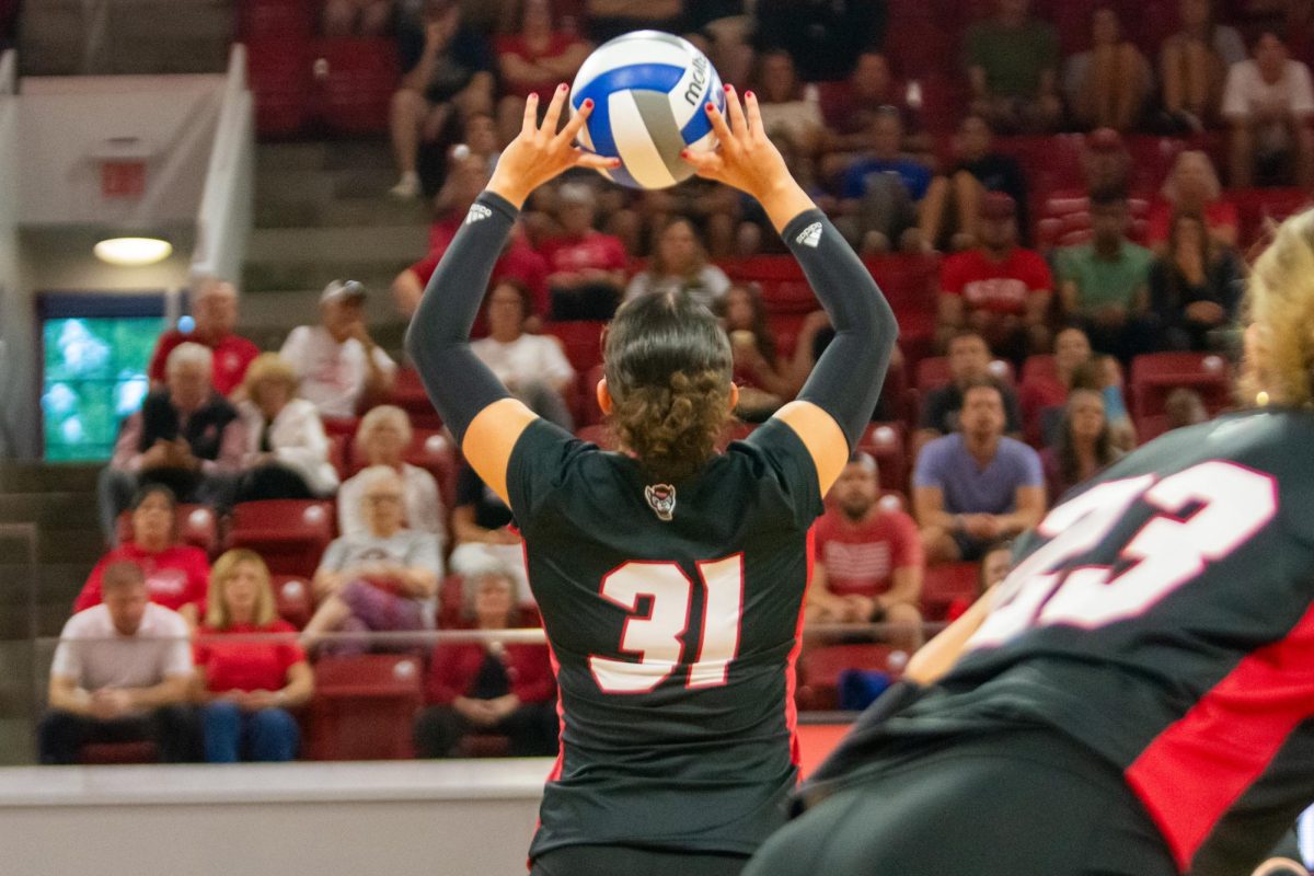 Redshirt junior setter Elaisa Villar sets the ball during the match against Cleveland State in Reynolds Coliseum on Saturday, Sept. 13, 2025. Villar made nineteen assists. The Wolfpack defeated the Vikings 3-0.