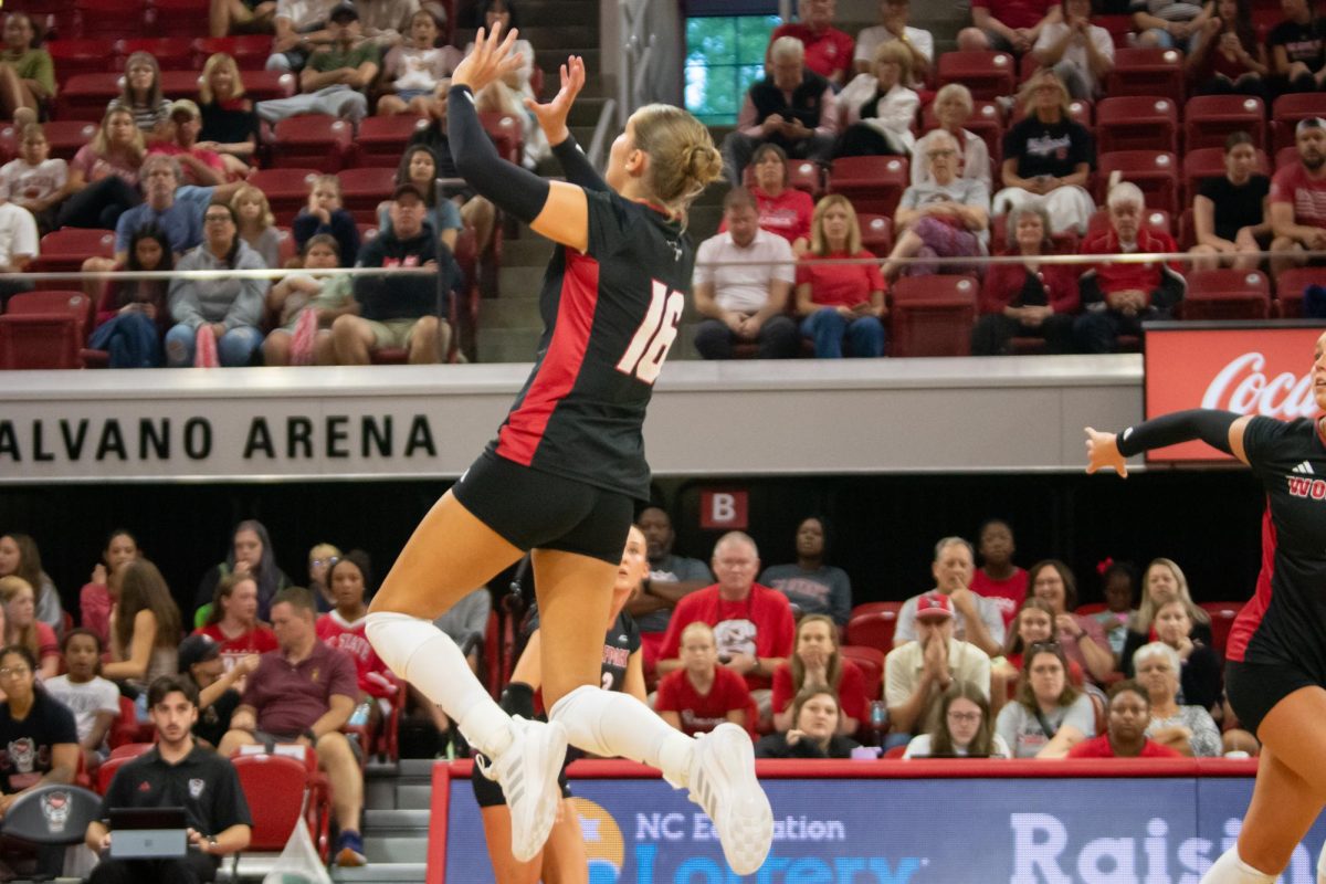 Sophomore setter Ashley Mullen jumps to set the ball during the match against Cleveland State in Reynolds Coliseum on Saturday, Sept. 13, 2025. Mullen made nine assists. The Wolfpack defeated the Vikings 3-0.