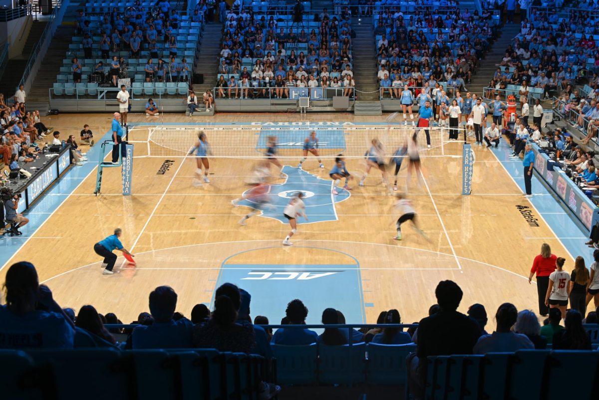 NC State goes to block the oncoming spike during the game against UNC-Chapel Hill on Sunday, Sept. 28, 2025. The wolfpack tallied 48 combined kills. NC State fell to UNC-Chapel Hill 3-1.