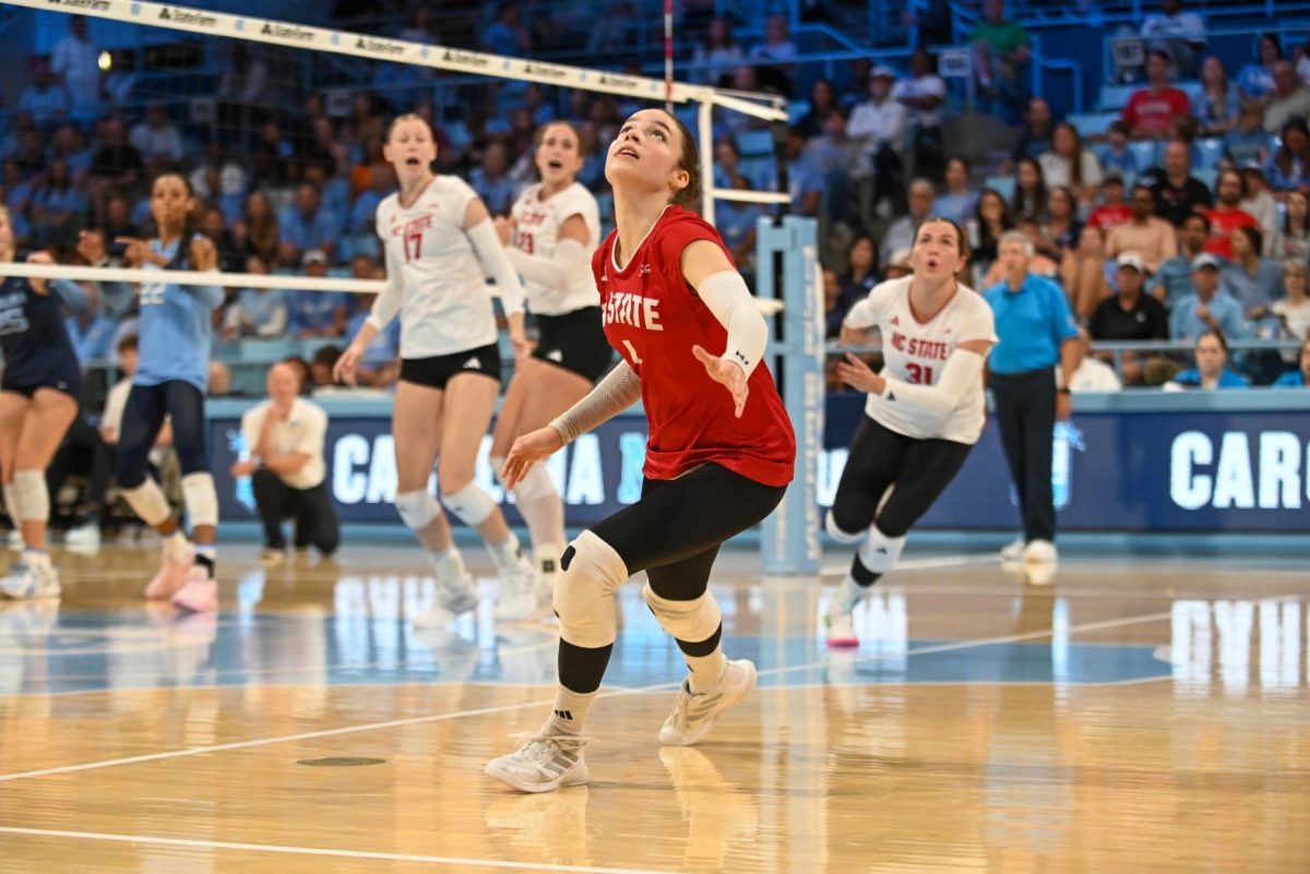Freshman libero Zuzia Maciejewicz runs to return the spike during the game against UNC-Chapel Hill on Sunday, Sept. 28, 2025. Maciejewicz had three set assists. NC State fell to UNC-Chapel Hill 3-1.