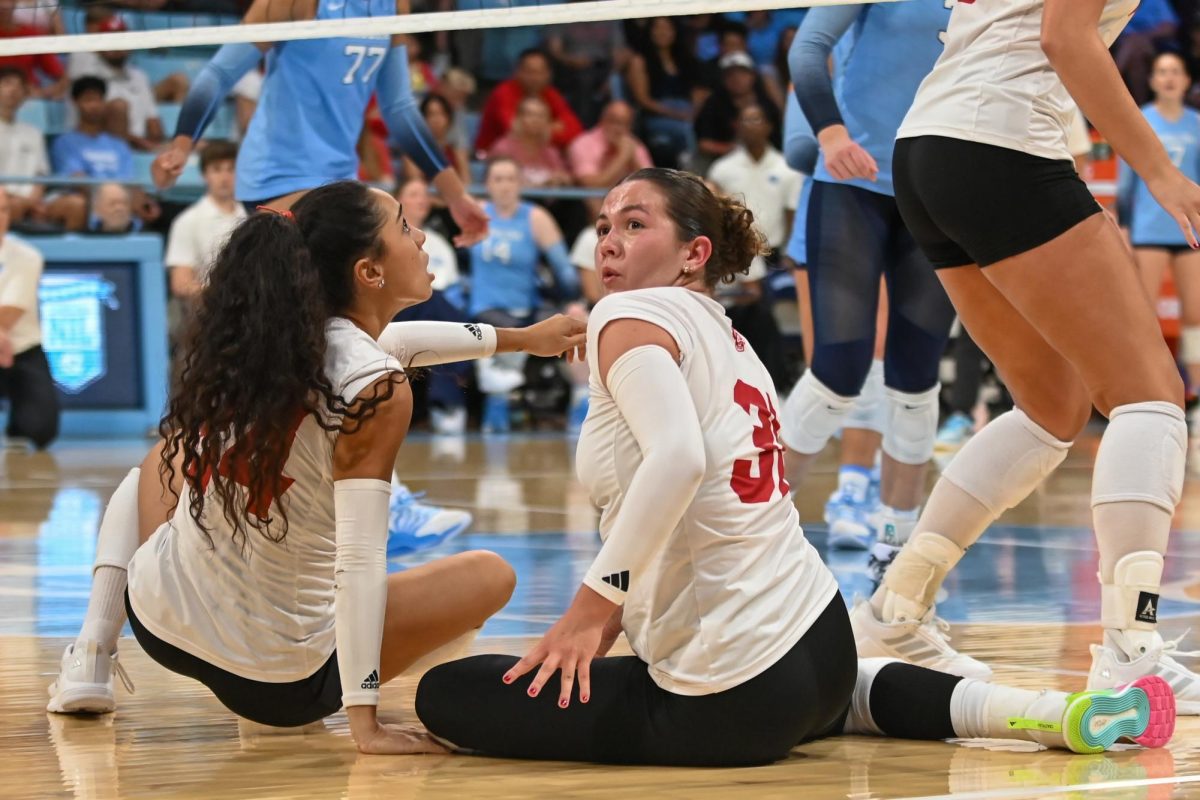 Redshirt junior defensive specialist Elaisa Villar looks back at the crowd after the point during the game against UNC-Chapel Hill on Sunday, Sept. 28, 2025. Villar had one kill. NC State fell to UNC-Chapel Hill 3-1.