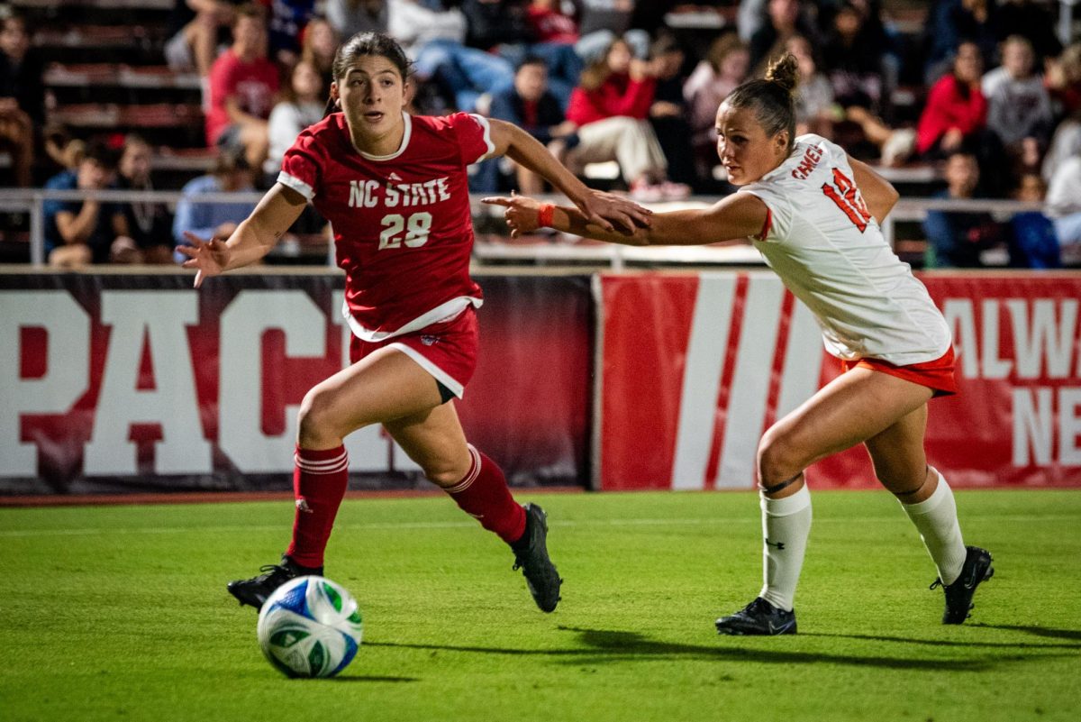Junior forward Sophia Hernandez speeds past a defender during the game against Campbell in Dail Soccer Stadium on Sunday, Sept. 7, 2025. The Wolfpack defeated the Camels 4-0.
