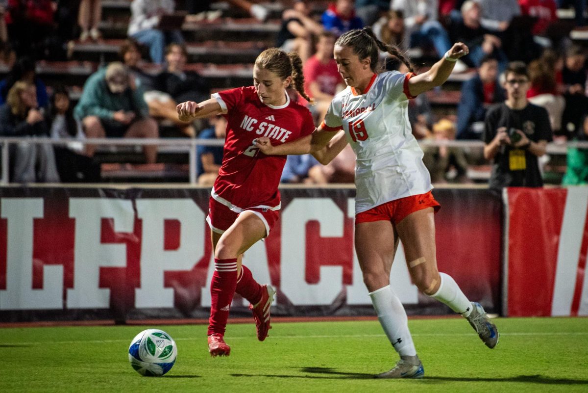 Junior midfielder Mary Frances Symmes fends off a Campbell defender during the game in Dail Soccer Stadium on Sunday, Sept. 7, 2025. The Wolfpack defeated the Camels 4-0.