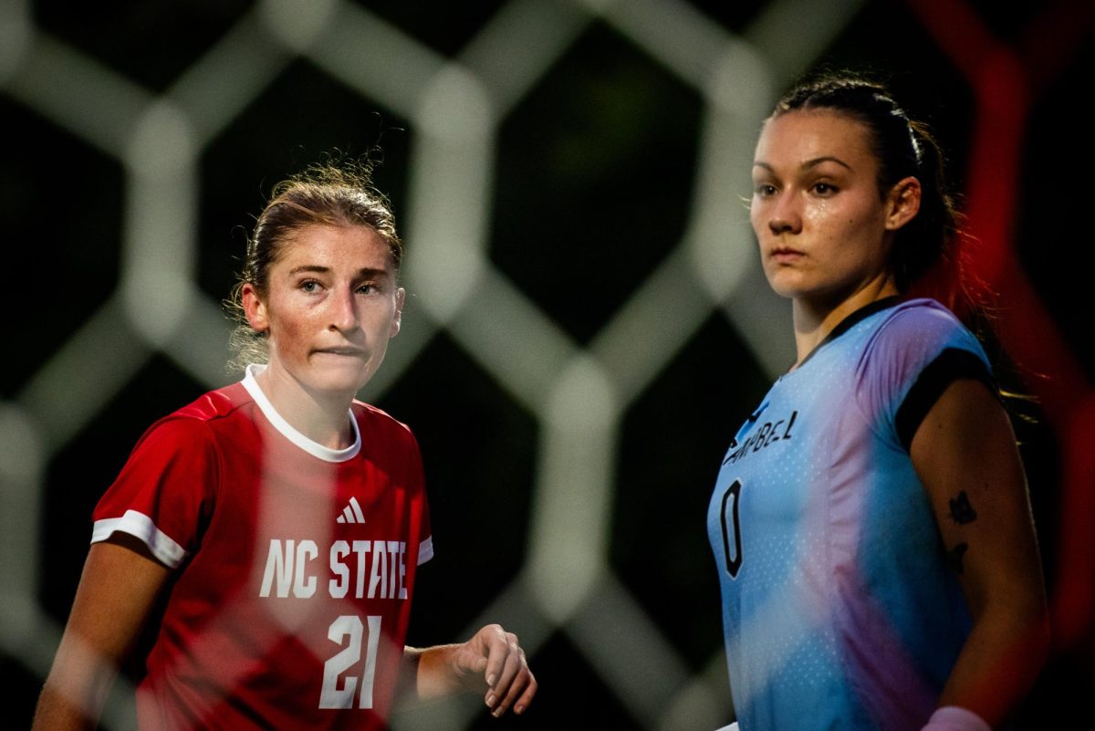 Junior midfielder Mary Frances Symmes stands next to the Campbell goalkeeper before a corner kick during the game in Dail Soccer Stadium on Sunday, Sept. 7, 2025. The Wolfpack defeated the Camels 4-0.