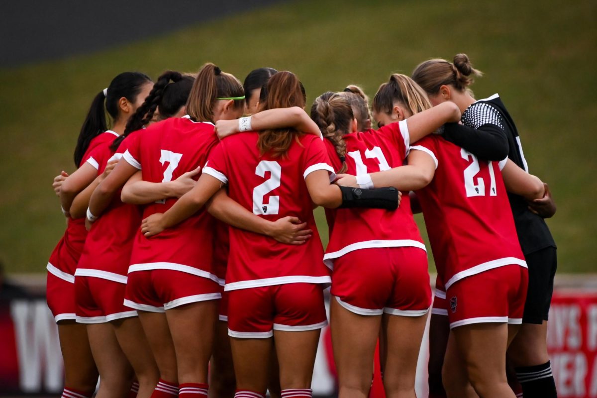 The NC State women's soccer team huddles up before the game against Campbell in Dail Soccer Stadium on Sunday, Sept. 7, 2025. The Wolfpack defeated the Camels 4-0.
