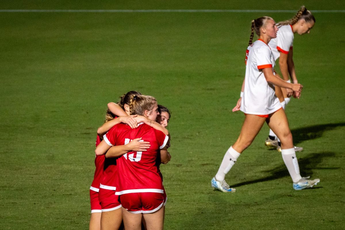 The NC State women's soccer team embraces after a goal during the game against Campbell in Dail Soccer Stadium on Sunday, Sept. 7, 2025. The Wolfpack defeated the Camels 4-0.