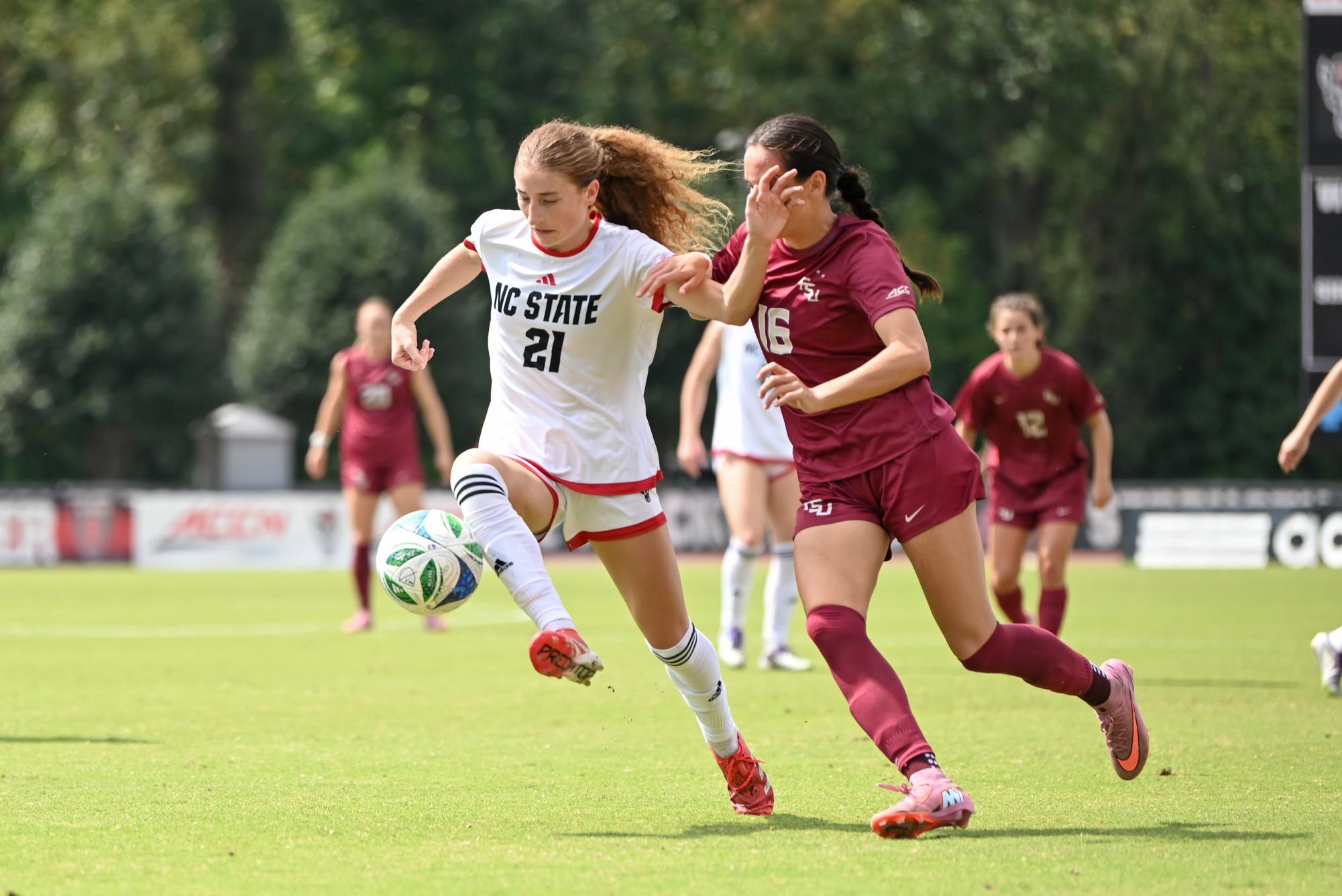 Junior midfielder Mary Frances Symmes dribbles the ball during the game against Florida State in Dail Soccer Stadium on Sunday Sept. 21; 2025. NC State tied Florida State 1-1.