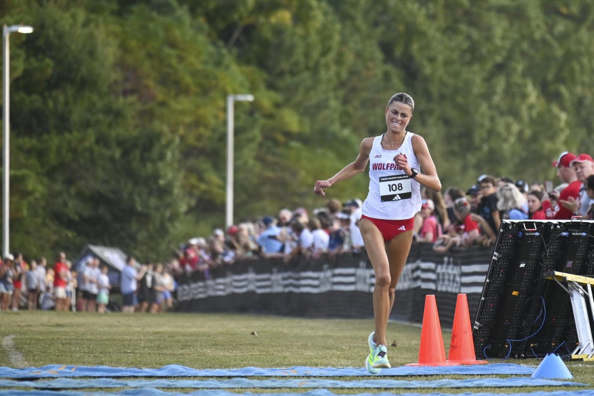 Sophomore Hannah Gapes crosses the finish lineduring the Adidas XC Challenge in WakeMed Soccer Park on Friday, Sept. 19, 2025. Gapes finished first in the women's 5k with a time of 16:01.8. NC State's women's team finished first overall with a score of 38 points.