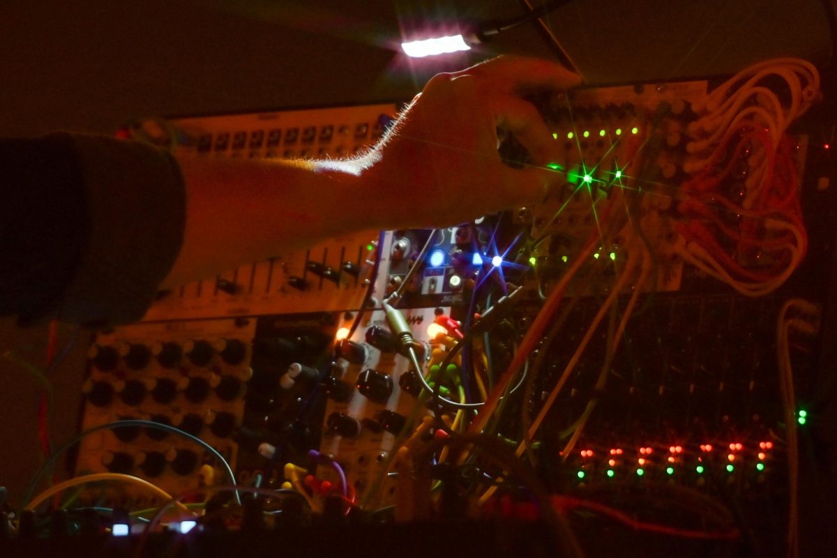 Jeremiah Chiu, a Los-Angeles multi-media synthesist, performs in Nash Hall in downtown Raleigh during day three of Hopscotch Festival on Saturday, Sept. 7, 2025. Chiu utilized a variety of instruments and objects during his performance, such as crowd noise played from an iPhone.